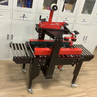 Elektrisch angetriebene halbautomatische Gehäuse Kartonbox Verdichter mit Universalrad
